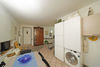 Zweizimmerwohnung im Hochparterre in einem Kontext mit Grünflächen im Zentrum von Moniga del Garda