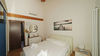 Wohnung im ersten Stock einer Wohnanlage mit Swimmingpool in Manerba del Garda