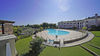 Wohnung im ersten Stock einer Wohnanlage mit Swimmingpool in Manerba del Garda