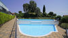 Wohnung mit zwei Terrassen und zwei überdachten Stellplätzen in einer Wohnanlage mit Pool in Manerba del Garda
