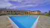 Luminoso trilocale al piano terra in curato residence con piscina a Puegnago del Garda