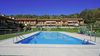 Zweizimmerwohnung mit privatem Garten in einer Wohnanlage mit Schwimmbad in Puegnago del Garda