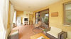 Zweizimmerwohnung mit großer Veranda und Garten in renommierter Wohnanlage in Manerba del Garda