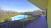 Ampia porzione di bifamiliare in residence con spazi verdi e piscina a Manerba del Garda