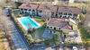 Eckwohnung mit privatem Garten in einer Wohnanlage mit Pool in Manerba del Garda