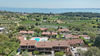 Wohnung mit Seeblick, Garten und Designer-Interieur in Soiano del Lago