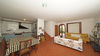 Geräumige Vierzimmerwohnung im Erdgeschoss mit Seeblick in eleganter Anlage in Soiano del Lago