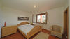 Geräumige Vierzimmerwohnung im Erdgeschoss mit Seeblick in eleganter Anlage in Soiano del Lago