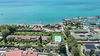 Appartamento fronte lago con giardino privato in residence esclusivo a Moniga del Garda