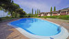 Zweizimmerwohnung mit zwei terrassierten Gärten und Stellplatz, in Residenz mit Pool, in Gardone Riviera zu verkaufen