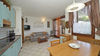 Zweizimmerwohnung mit zwei terrassierten Gärten und Stellplatz, in Residenz mit Pool, in Gardone Riviera zu verkaufen