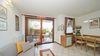 Zweizimmerwohnung mit zwei terrassierten Gärten und Stellplatz, in Residenz mit Pool, in Gardone Riviera zu verkaufen