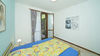 Zweizimmerwohnung mit zwei terrassierten Gärten und Stellplatz, in Residenz mit Pool, in Gardone Riviera zu verkaufen