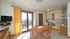 Leuchtende Dreizimmerwohnung auf einer Ebene mit wunderschöner Terrasse in Gardone Riviera zum Verkauf