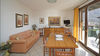 Leuchtende Dreizimmerwohnung auf einer Ebene mit wunderschöner Terrasse in Gardone Riviera zum Verkauf