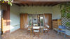 Dreizimmerwohnung mit Seeblick und privatem Garten, in gepflegter Residenz mit Pool, in Gardone Riviera zu verkaufen