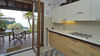 Dreizimmerwohnung mit Seeblick und privatem Garten, in gepflegter Residenz mit Pool, in Gardone Riviera zu verkaufen