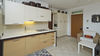 Dreizimmerwohnung mit Seeblick und privatem Garten, in gepflegter Residenz mit Pool, in Gardone Riviera zu verkaufen