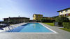 Trilocale vista lago in zona panoramica, in residence con piscina a Serniga, Salò