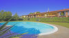 Leuchtende Dreizimmerwohnung mit exklusiver Terrasse, in Residenz mit Pool in Portese zum Verkauf
