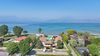 Lugana di Sirmione, trilocale in residence esclusivo fronte lago con piscina in vendita