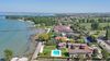 Lugana di Sirmione, trilocale in residence esclusivo fronte lago con piscina in vendita
