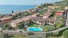 Zweizimmerwohnung mit Terrasse in einer Residenz mit Pool in Cecina di Toscolano Maderno